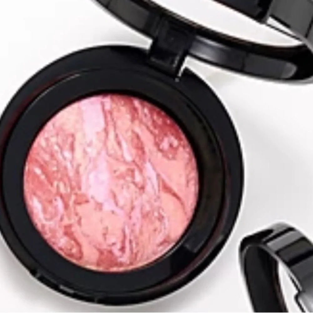 Laura Geller Blush-N-Brighten in TROPIC HUES, swirls of coral, pink, and…
